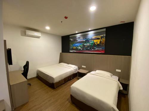 Ένα ή περισσότερα κρεβάτια σε δωμάτιο στο Arafah Hotel