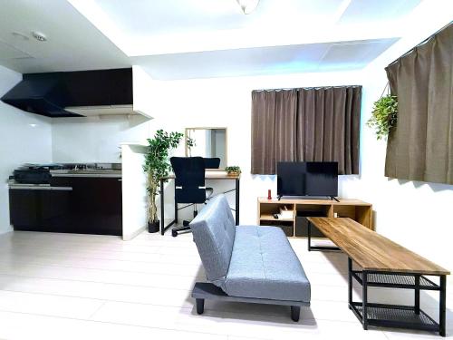 Kuchyň nebo kuchyňský kout v ubytování Glory 豊平 -FIX HOME-