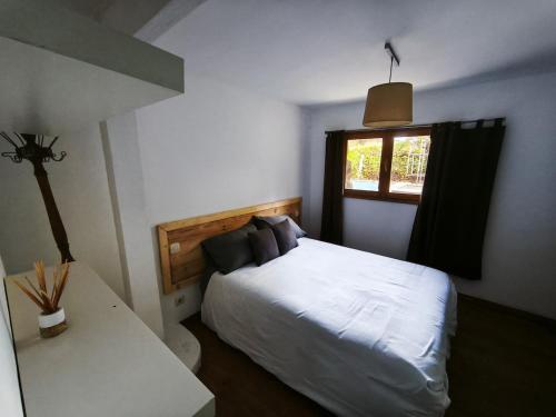 En eller flere senge i et værelse på La casa Calabaza