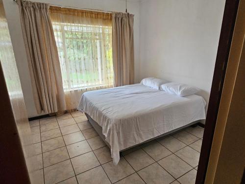 En eller flere senge i et værelse på The comfort