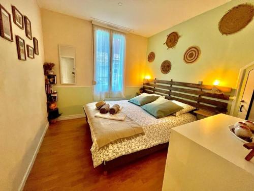 L'App' Art, Jolie vue mer en RDC à 200 m de la plageにあるベッド