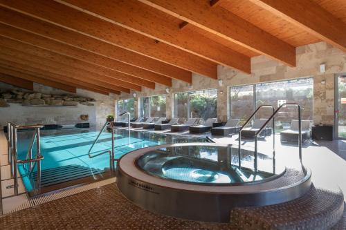 Πισίνα στο ή κοντά στο Village Resort Hanuliak Apartmany