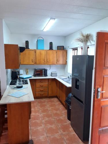 Kuchyň nebo kuchyňský kout v ubytování The Green Outpost