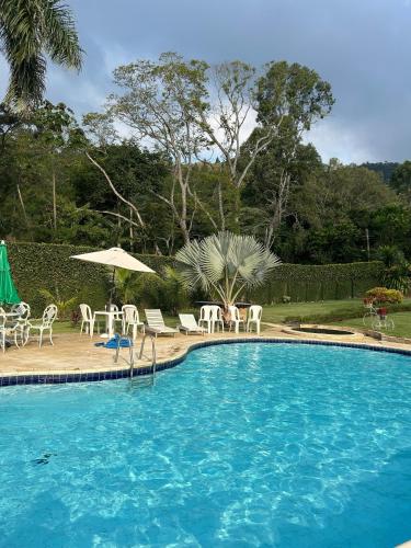 Bazén v ubytování Sitio esperança nebo v jeho okolí