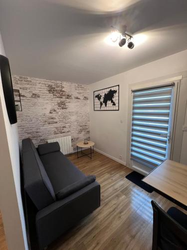 Posezení v ubytování Appartement avec terrasse