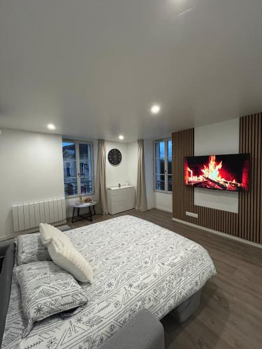 Ένα ή περισσότερα κρεβάτια σε δωμάτιο στο Bright studio 9 minutes from Disneyland Paris