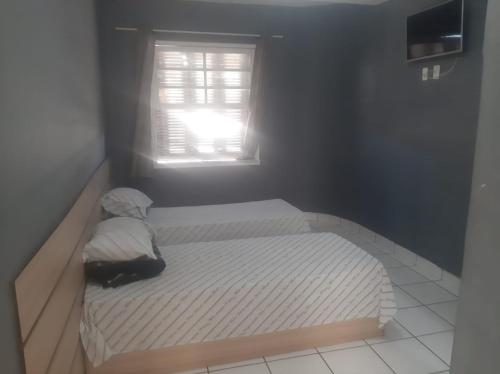 Ένα ή περισσότερα κρεβάτια σε δωμάτιο στο Hotel Vitória Palace