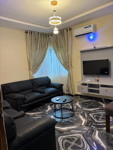 TV a/nebo společenská místnost v ubytování Bollington Adex house