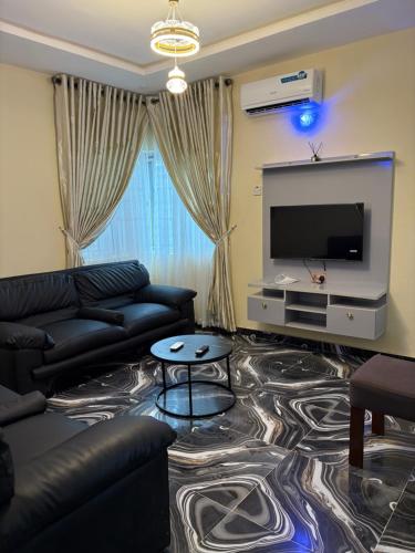 TV a/nebo společenská místnost v ubytování Bollington Adex house