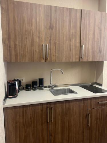 Η κουζίνα ή μικρή κουζίνα στο Bakunin CRYSTAL RESORT