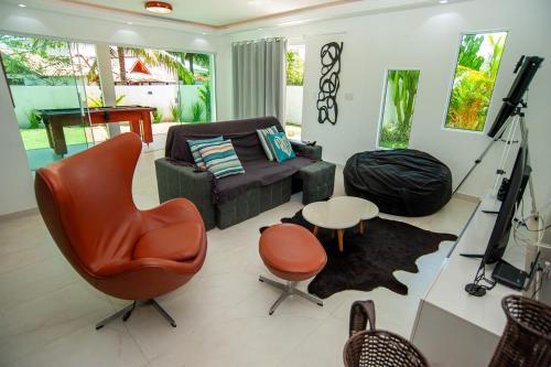 Χώρος καθιστικού στο Casa com Piscina, Quadra de Areia e Churrasqueira