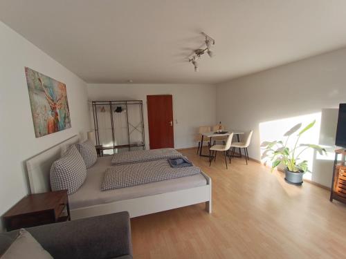 Ένα ή περισσότερα κρεβάτια σε δωμάτιο στο Studio Apartment Staufenflair