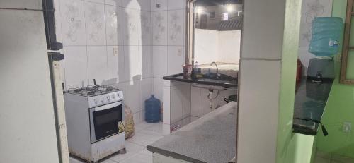 Köök või kööginurk majutusasutuses Casa ds férias com piscina