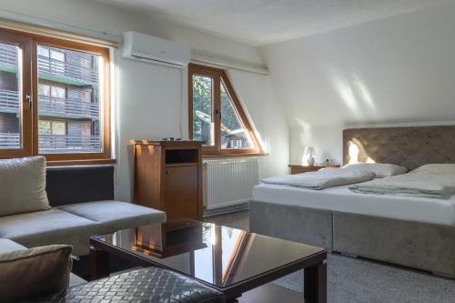 Postel nebo postele na pokoji v ubytování Pansion A&M Vlašić