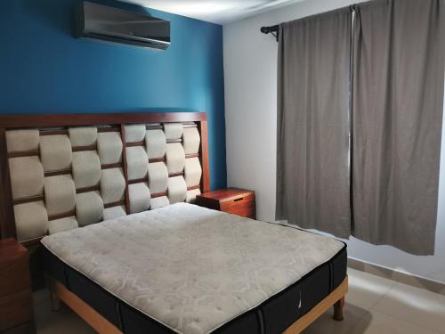 Ένα ή περισσότερα κρεβάτια σε δωμάτιο στο Casa hojazen