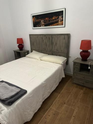 Ένα ή περισσότερα κρεβάτια σε δωμάτιο στο El rincón de Nicolás