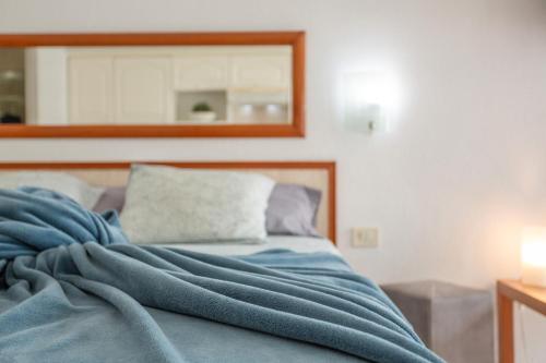 Ένα ή περισσότερα κρεβάτια σε δωμάτιο στο Atlantic Ocean Rest Mesa del Mar