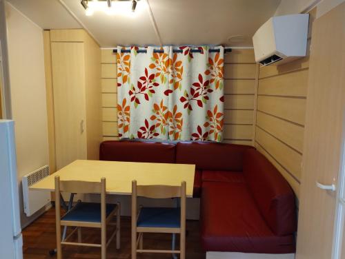 Posezení v ubytování Mobil Home 6 pers avec clim réversible