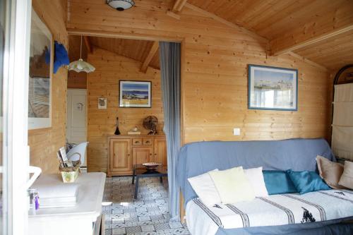 Posezení v ubytování Chalet 213 en lisière de forêt