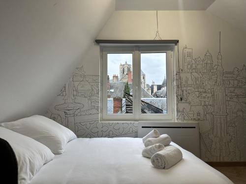 Ένα ή περισσότερα κρεβάτια σε δωμάτιο στο Le Coursarlon