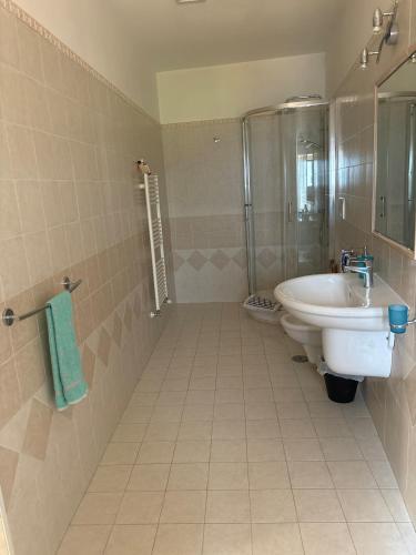 a bathroom with a sink and a shower at A Casa di Ilary in Ravello