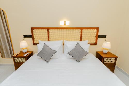 Postel nebo postele na pokoji v ubytování Arco Mirissa