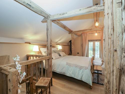 En eller flere senge i et værelse på The Cow Shed