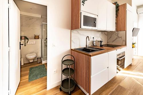 Kuchyň nebo kuchyňský kout v ubytování VERDUN - Appartement Cosy - Hyper Centre Menton