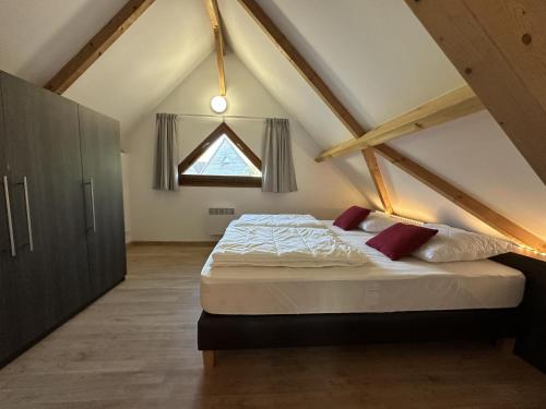 Ένα ή περισσότερα κρεβάτια σε δωμάτιο στο Lac Bleu nr 14