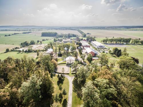 an aerial view of a farm with trees and houses at Penzion Albertovec in Opava
