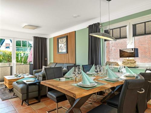 Et opholdsområde på Doppelhäuser Timmendorf Strand Haus Neptun