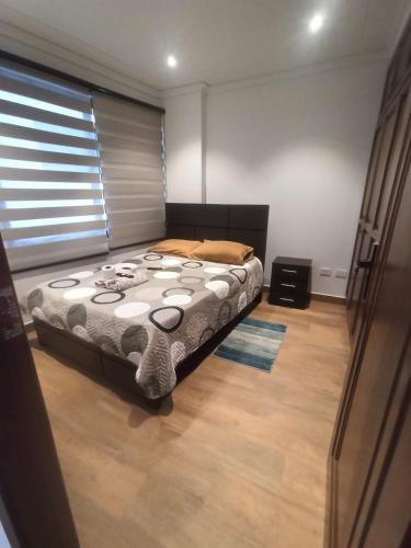 Postel nebo postele na pokoji v ubytování Edificio TOP HOUSE