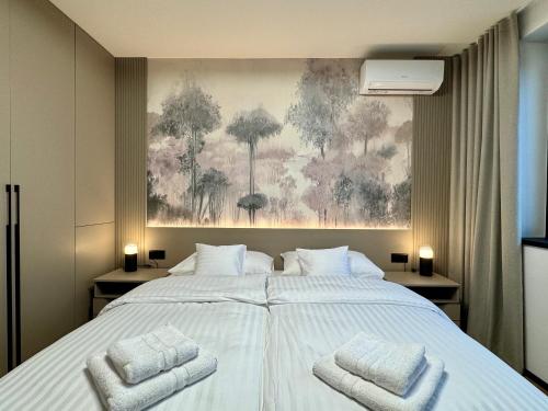 Ένα ή περισσότερα κρεβάτια σε δωμάτιο στο Central Lux Apartment