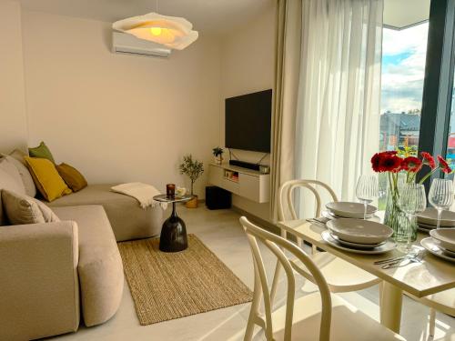 TV a/nebo společenská místnost v ubytování Borowikova Bałtycka Oaza Basen Sauna Jacuzzi