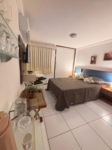 Una cama o camas en una habitación de Flat Completo Natal Praia do Meio