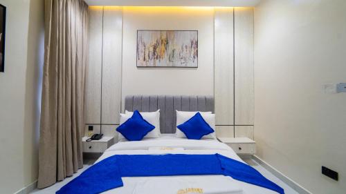 Ένα ή περισσότερα κρεβάτια σε δωμάτιο στο Luxury Apartments & Homes