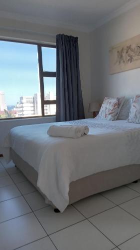 Ένα ή περισσότερα κρεβάτια σε δωμάτιο στο Westville passion place