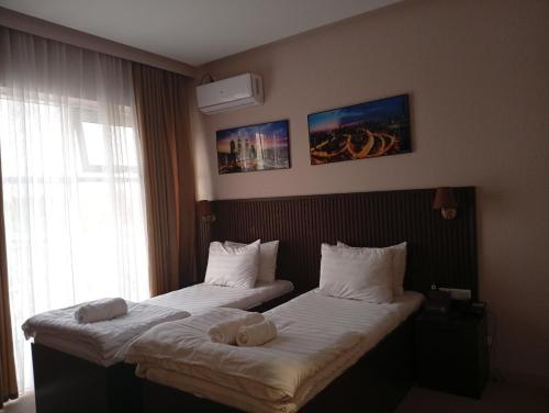 Postel nebo postele na pokoji v ubytování Mameen