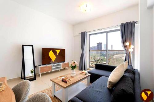 Vogue Vacation Homes, JVC Jeewar Tower near Circle Mall, One Bedroom Apartment with Balcony and Park view, Access to all Amenities
