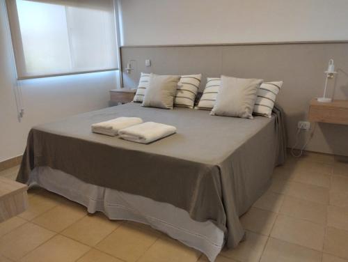 Postel nebo postele na pokoji v ubytování Posada Atama