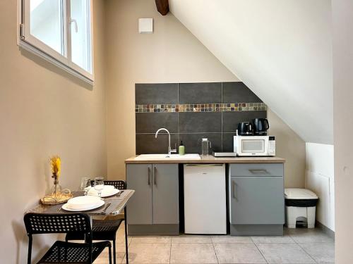 Kuchyň nebo kuchyňský kout v ubytování T1 Cocon de charme & confort, Amiens centre