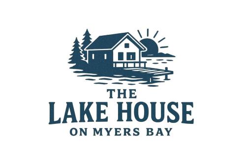 un logo pour la maison du lac sur la baie de Myers dans l'établissement The Lake House on Myers Bay - 3-Bed 2-Bath Luxury Home with Private Pier Beach Firepit and Deck, à Fox Lake