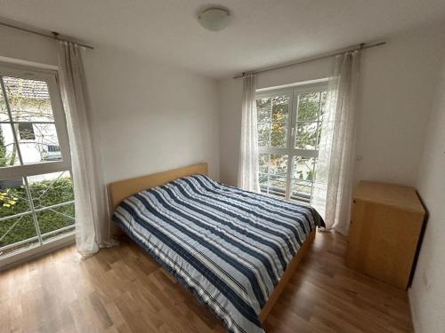 Postel nebo postele na pokoji v ubytování Helles, geräumiges Haus in München-Solln