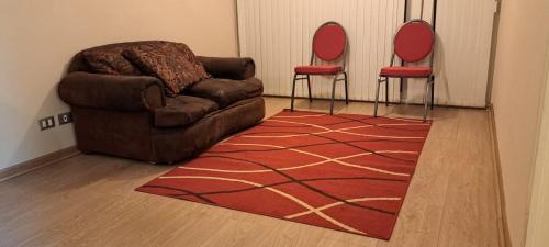 Χώρος καθιστικού στο Hermoso departamento a pasos de la plaza de Chillan