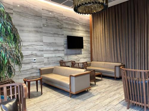 TV/trung tâm giải trí tại Mirage suite