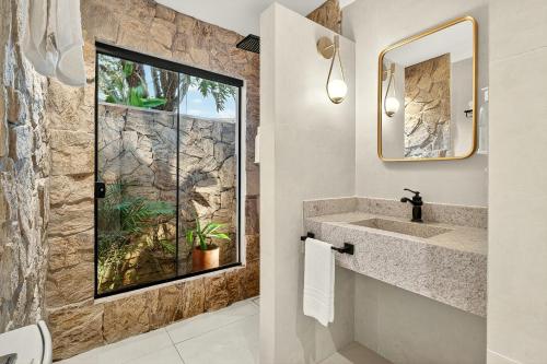 Koupelna v ubytování Grinbergs Village Hotel