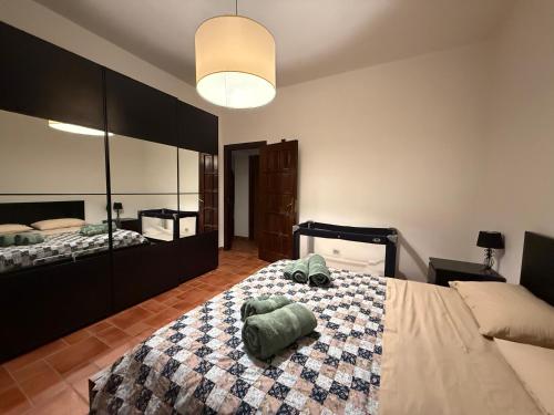 Ένα ή περισσότερα κρεβάτια σε δωμάτιο στο Dal Cappellaio Matto