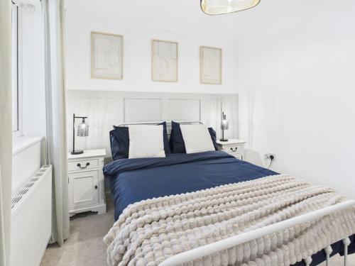 En eller flere senge i et værelse på Riviera Cottage - Cornwall