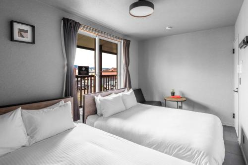 Postel nebo postele na pokoji v ubytování SNOWGARDEN YIG STAY - Vacation STAY 65492v