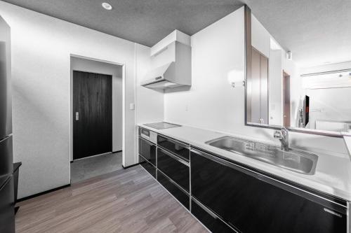 Kuchyň nebo kuchyňský kout v ubytování HOSHIYADO NAGAYAMA - Vacation STAY 68332v